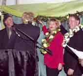 Photo shows dignatories at the ribbon cutting function.
